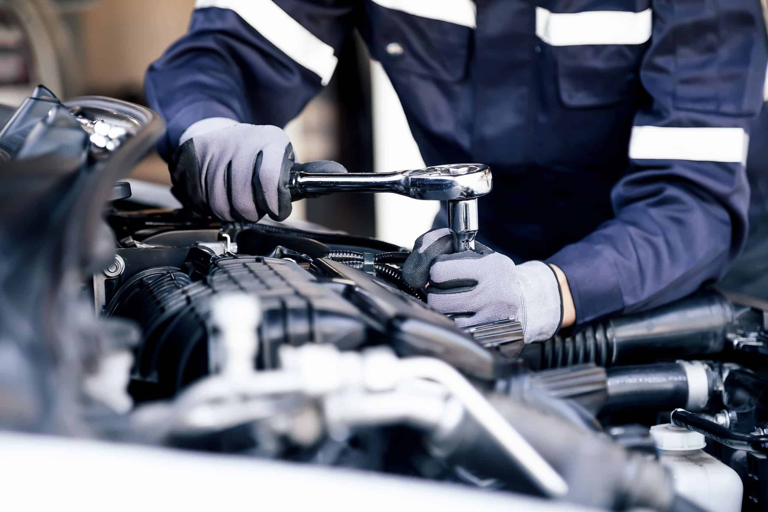 Mechanic working on car